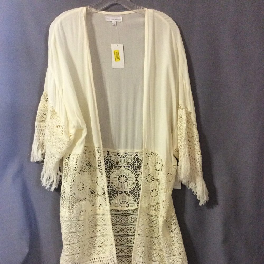 Long off white shrug with crochet detail